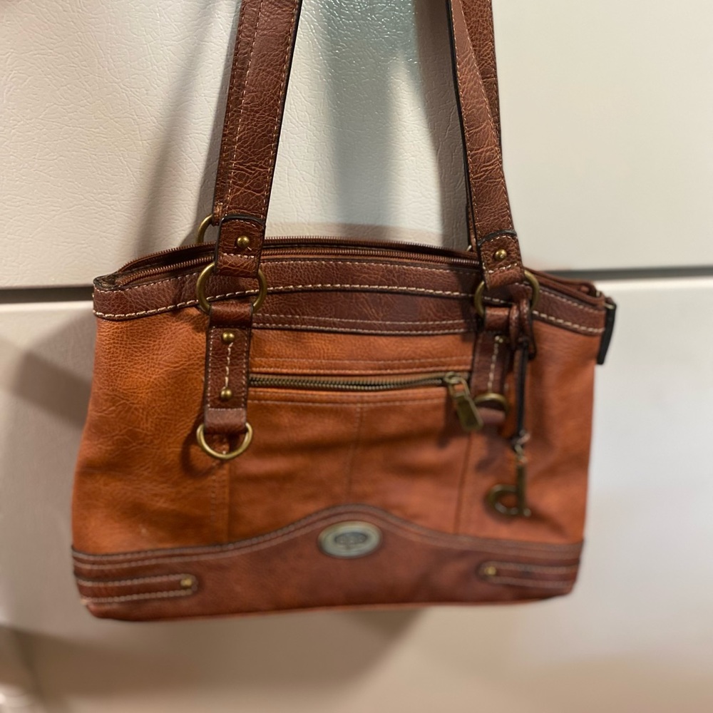 Womens New without tags BOC handbag with power bank included